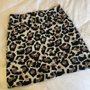 Ann Taylor Loft animal print skirt with wide waistband, pockets, and side zip.